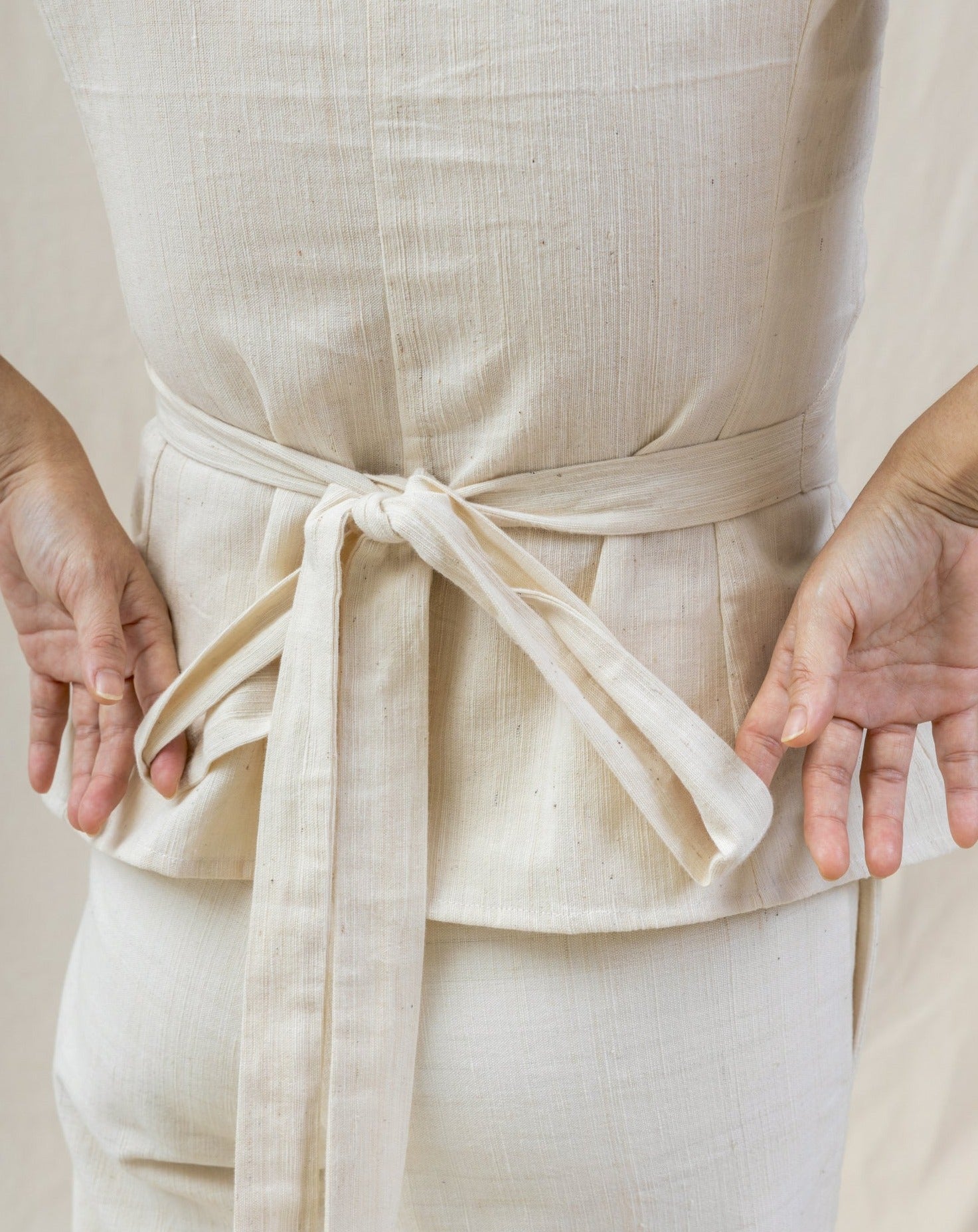 white floral embroidered obi from regenerative cotton